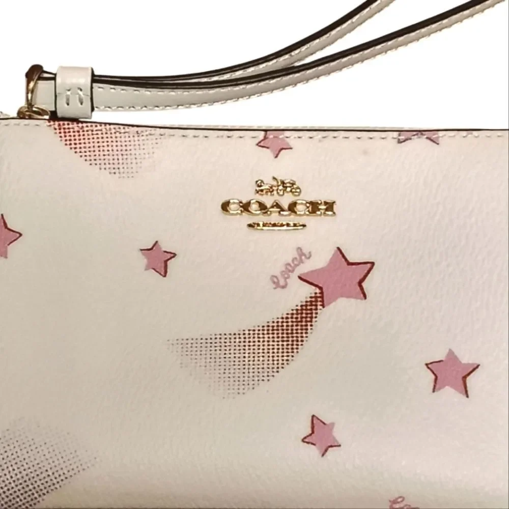 Like New COACH Shooting Stars & Logo Zip Wristlet Pouch